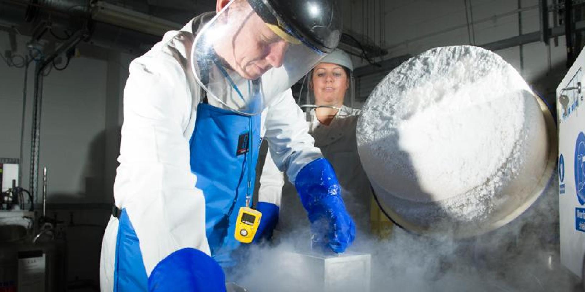 Dr Rod Mitchell removing a rack of clinical human tissue from the liquid nitrogen cryostorage tank.