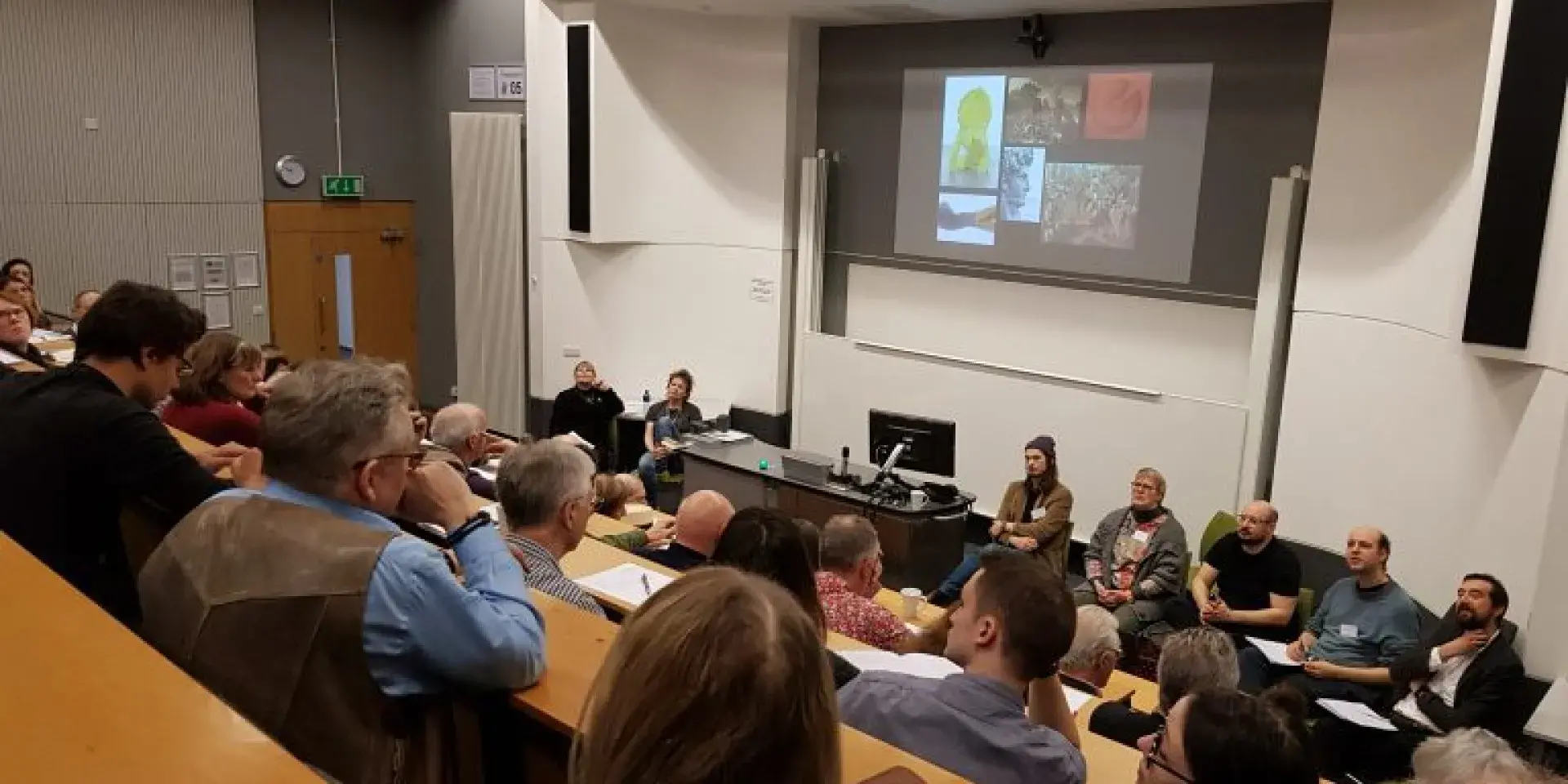 Photo showing a lecture theatre with an audience and presenters during Extreme Imagination Conference 2019