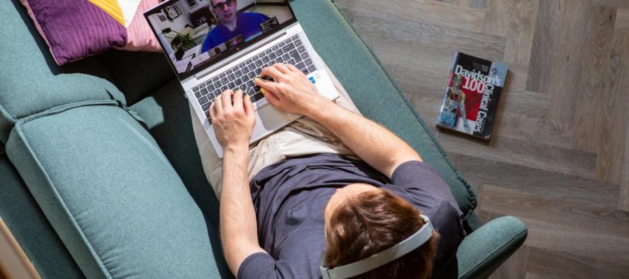 Overhead shot of a student doing an online course on a laptop