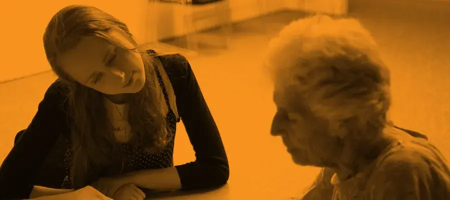 Medical student and medical alumni exploring the university archives