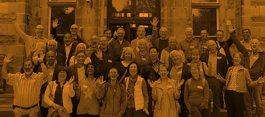 Class photo of an alumni group outside Edinburgh Futures Institute