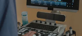 Clinician using an ultrasound machine