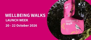 Pink background with image showing pink signs with trees in background. Text reads Wellbeing Walks Launch Week