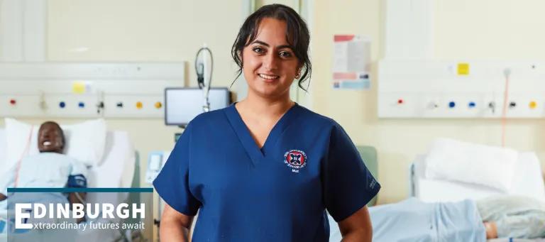 Clinical educator on a clinical skills teaching ward with medical training manikins.