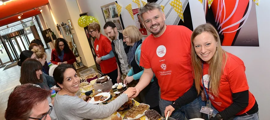 Bake-off star Glen Cosby and Vet School students at the bake sale