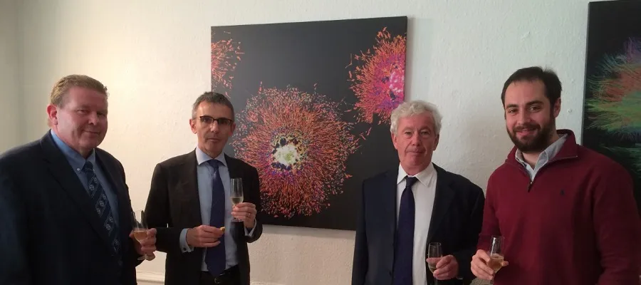 Carlo Perrotta, Sir Timothy O'Shea and Professor Edwin JR van Beek with Dr Dario Magnani. 