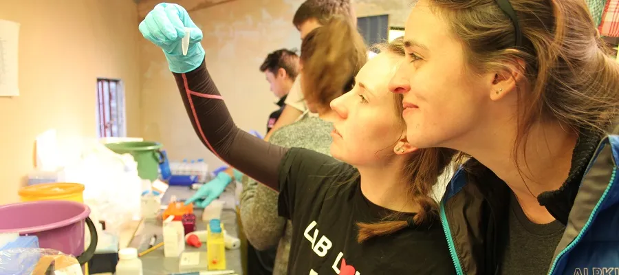 The Apex 5 team doing research in the lab