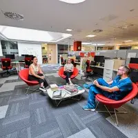 People meeting in open plan office