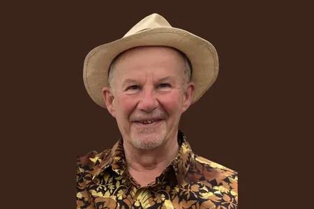 Headshot of Richard de Soldenhoff wearing a hat
