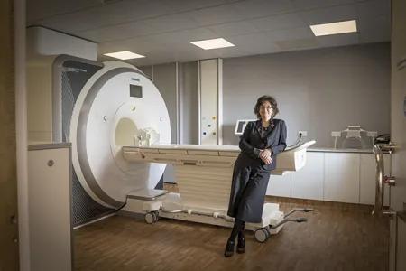 Joanna standing in front a body scanner