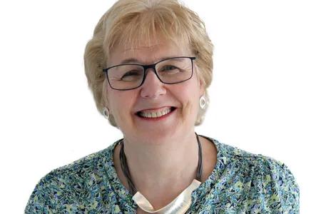 Head shot of Carmel against white background