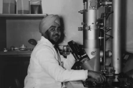 Black and white photo of Ranjeet in the lab