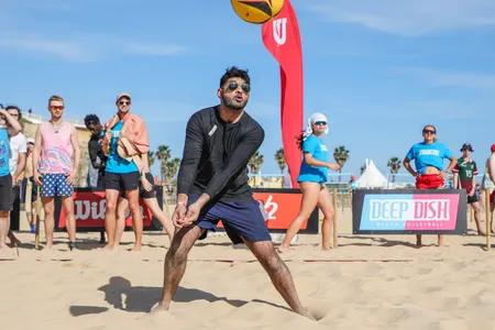Adam playing volleyball