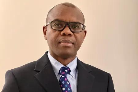Head shot of Olayinka Ogundipe against neutral background
