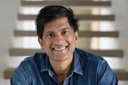 Head shot of Rangan smiling