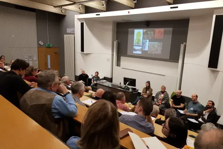 Photo showing a lecture theatre with an audience and presenters during Extreme Imagination Conference 2019