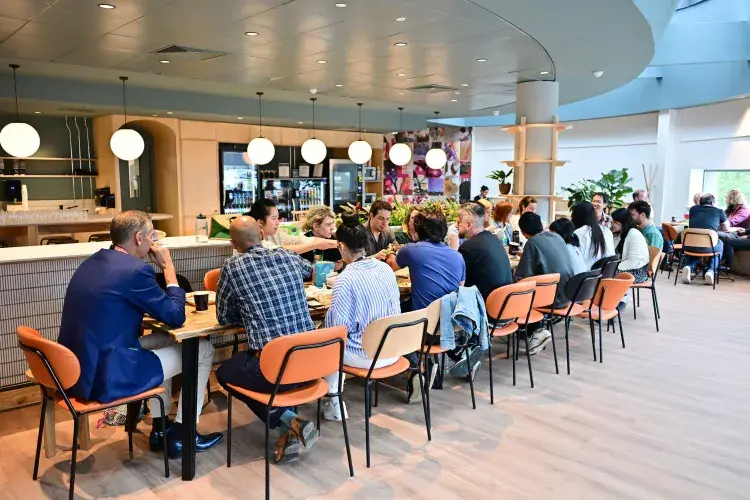 People eating in community space
