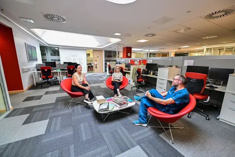 People meeting in open plan office