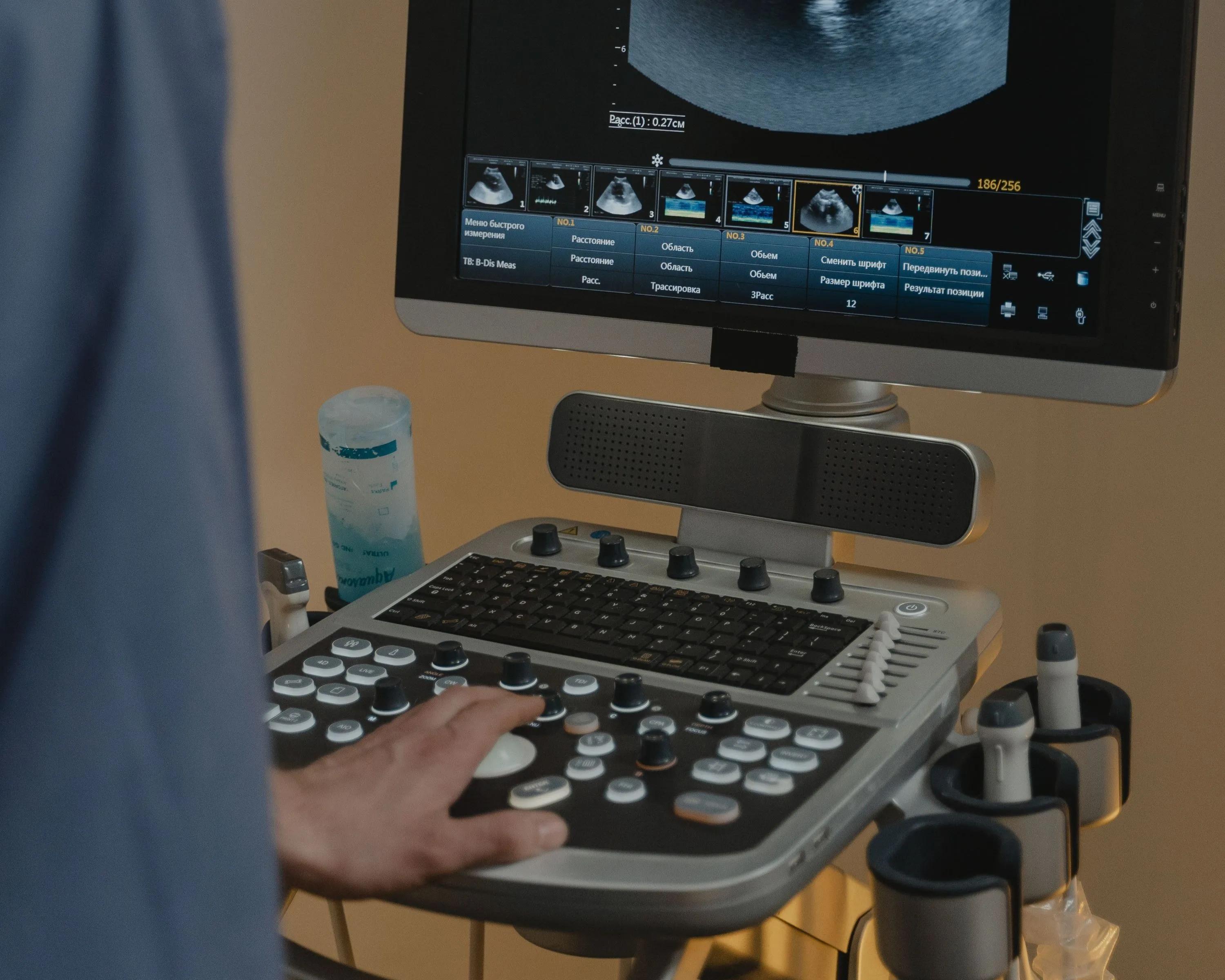 Clinician using an ultrasound machine