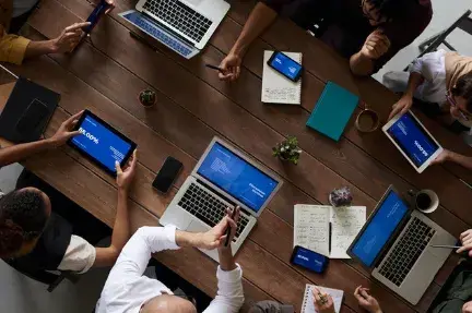 People working at laptops