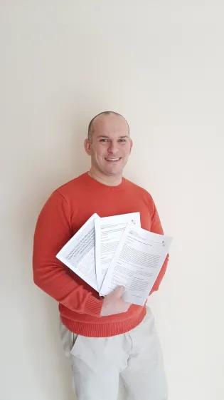 emanuel standing with his published papers