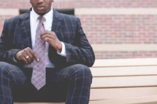 Man in suit waiting for viva to begin