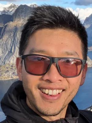 Head shot of Rong wearing sunglasses