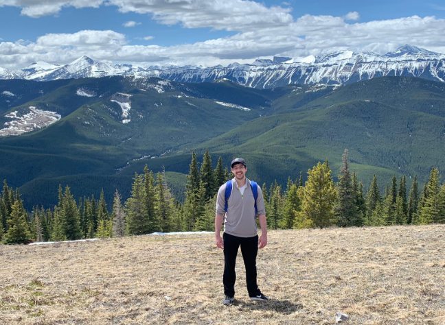 Matt hiking in the mountains