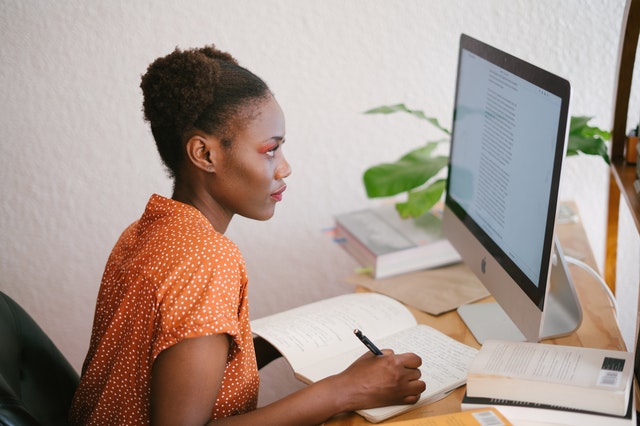 Woman looking at computer