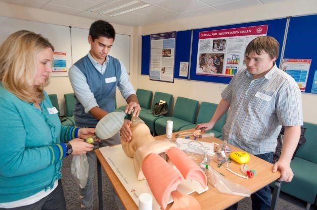 Students performing simulated cardiopulmonary resuscitation (CPR) 